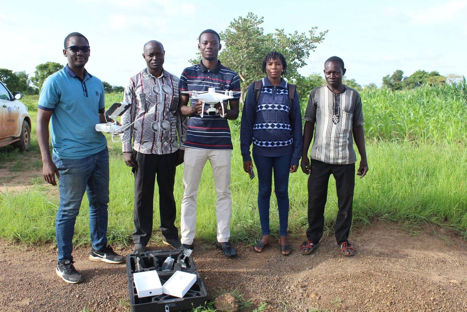 Project team with a drone during field data collection
